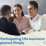 Middle-aged couple reviewing participating life insurance policy